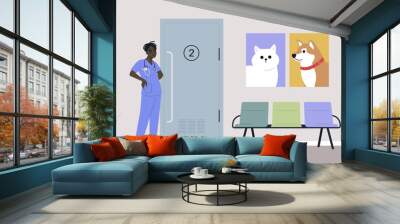 A young male African veterinary doctor waiting for visitors in the lobby, domestic animals health care Wall mural