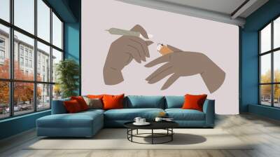 An isolated image of hands holding a lit cannabis joint and a lighter, recreational drugs, CBD hemp Wall mural