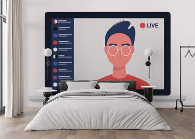 Young male blogger holding a live streaming online event, website interface Wall mural