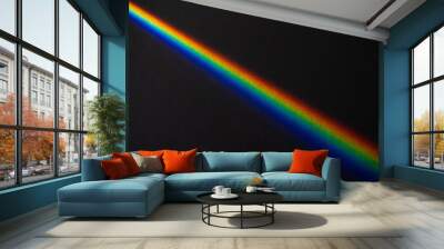 Rainbow streek on black textured paper background Wall mural