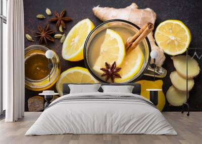 Autumn hot tea with ginger, lemon, honey and spices. Top view. Wall mural