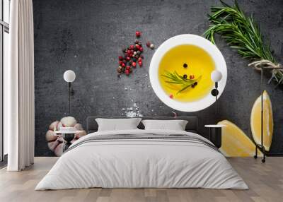 Black food background with olive oil and spices Wall mural