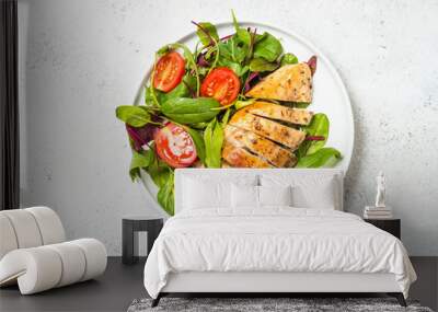 Chicken fillet with salad top view. Wall mural