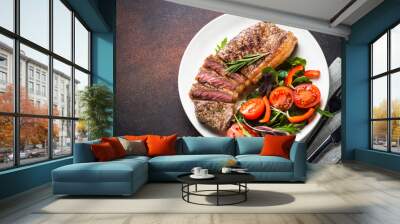 Grilled beef striploin steak with fresh salad top view. Wall mural