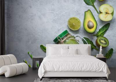 Healthy green food background - smoothie and ingredients. Wall mural