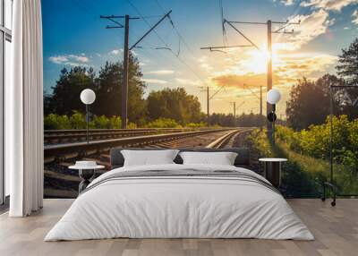 Industrial landscape with rails and railway on sunset. Wall mural