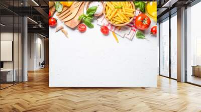 Italian food background on white top view. Wall mural