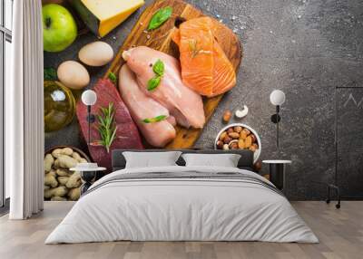 Ketogenic low carbs diet on dark stone table. Wall mural