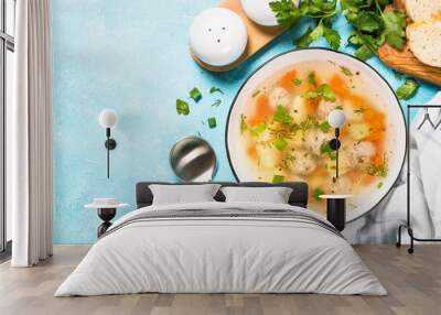 Meatballs soup with vegetables top view. Wall mural