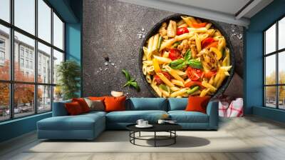 Pasta penne with chiken and vegetables. Wall mural