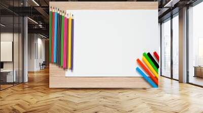 Pencils, crayons and album sheet Wall mural