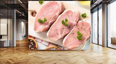 Pork meat steak on white top view. Wall mural