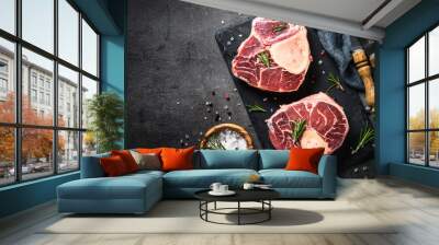 Raw beef steak osso bucco on black. Marble meat. Wall mural