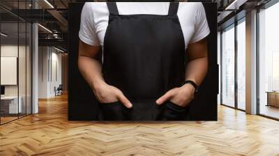 Black apron on a man closeup Wall mural