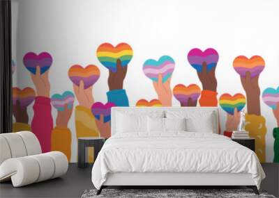 International day against homophobia, transphobia and biphobia vector. Hands holding different LGBT pride flag in heart shape. Wall mural