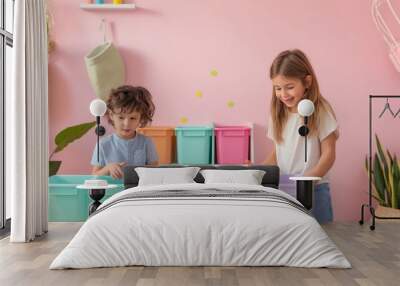 children opening colorful plastic boxes, highlighting an eco-friendly home organization concept in a pastel pink room with green plant decorations, emphasizing creativity Wall mural