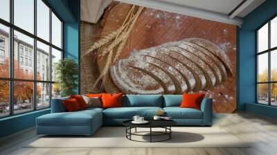 White wheat rye sliced tasty and delicious bread on wooden background Wall mural