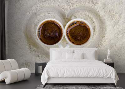 two cups with hot coffee on sand Wall mural