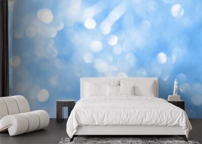 Bokeh light on blue background, sky with circle glitter light blue. Snow abstract soft glowing with vivid bright light and bokeh blur effect.  Wall mural