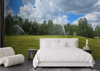 Sprinkler System Watering Golf Course Green Wall mural