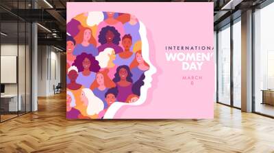 International Women's Day web banner concept. Vector cartoon illustration in a trendy flat style of a silhouette of woman's portrait in profile, made up of a pattern of many diverse women.  Wall mural