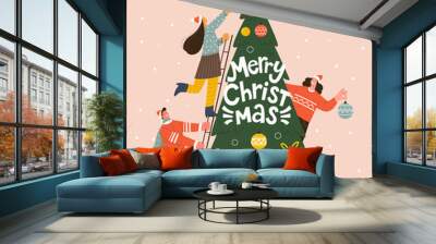 Merry Christmas greeting card. Vector illustration in trendy flat style of three people decorating Christmas tree Wall mural