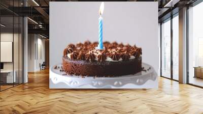 Happy Birthday Cake whit one blue candle isolated on white background Wall mural