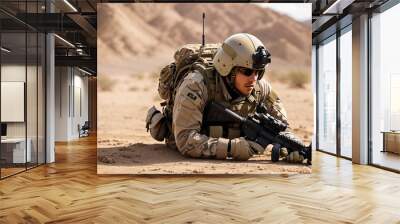 A soldier in full combat gear is crawling on the desert ground.

 Wall mural