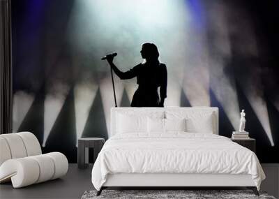 Vocalist singing to microphone. Singer in silhouette Wall mural