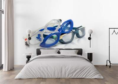 Swimming accessories on a white isolated background. Swimming goggles for swimming in the pool Wall mural