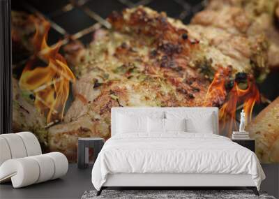 Pork steaks on the grill with flames Wall mural