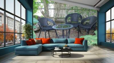 garden with plants and table with chairs Wall mural