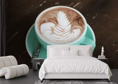 Hot chocolate on wooden table in cafe Wall mural