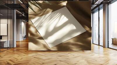 empty white paper sheet on brown background with shadows and sunlight glow  Wall mural