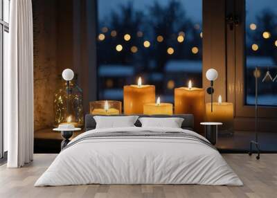 Beautiful burning candles and fairy lights on windowsill indoors Wall mural