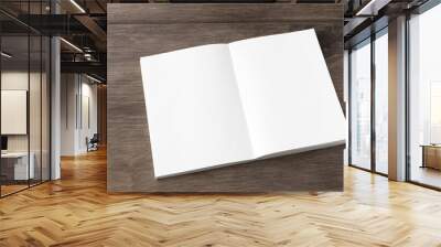 Blank white spread notebook on the desk from an oblique angle	 Wall mural