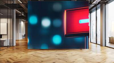 A vibrant red directional sign illuminated against blurred city background, conveying sense of guidance and movement. Wall mural