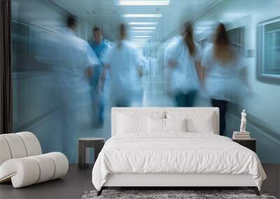 Long exposure blurred motion of medical doctors and nurses in a hospital ward wearing blue aprons, walking down a corridor Wall mural