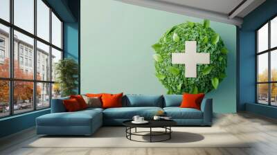 Sustainable Healthcare Planet Abstract Art with Green Leaves and Medical Cross on Minimalist Background for Enviro-friendly Medical Studies Wall mural