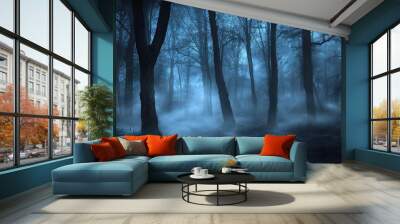 A spooky mist-covered forest on Halloween night, with shadows moving between the trees. Wall mural