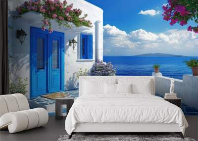 Beautiful greek house with blue door and window, stairs leading to the ocean in front of it, greece landscape, blue sky, white walls, blue tiles on roof. copy space for text. Wall mural