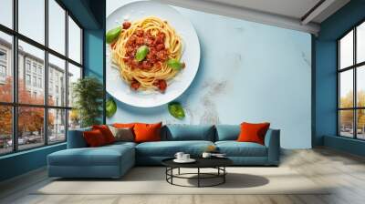 pasta spaghetti bolognese on a blue plate on white marble table. healthy food. view from above. image of food. copy space for text. Wall mural