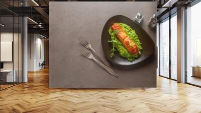 Grilled salmon pea puree decorated with mint on a brown plate. G Wall mural