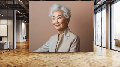 a woman with white hair and a suit jacket Wall mural