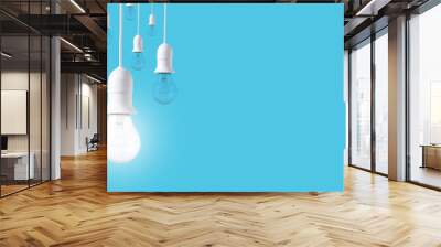 difference light bulb on blue background. concept of new ideas with innovation and creativity. Wall mural