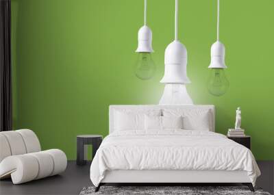 difference light bulb on green background. concept of new ideas with innovation and creativity. Wall mural