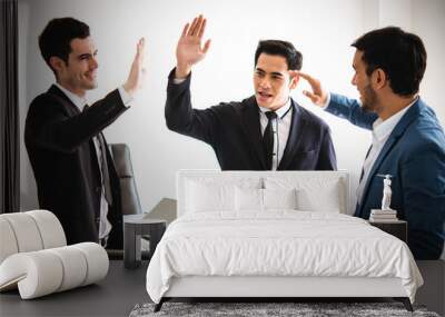 Three youngs business high-five join team,successful company. Wall mural