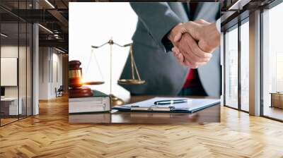 Businessman shaking hands,  partner lawyers or attorneys discussing a contract agreement Wall mural