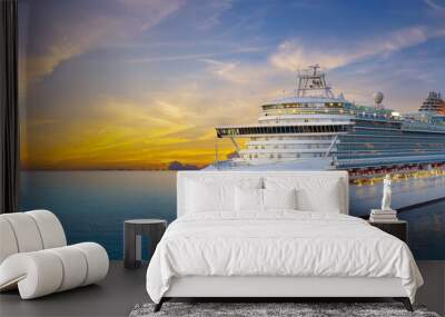 Luxury cruise ship sailing to port on sunrise  Wall mural