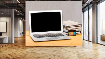 mocap Laptop with notebooks and office stuff on a wooden table. Wall mural